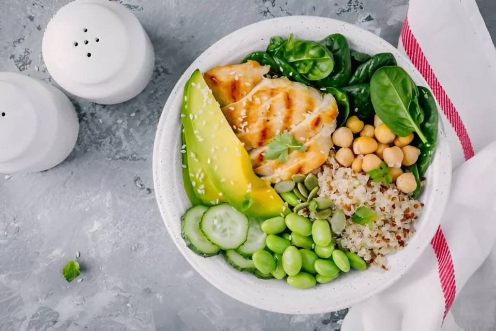 Homemade salmon poke bowl with a mix of fresh veggies and savory sauce